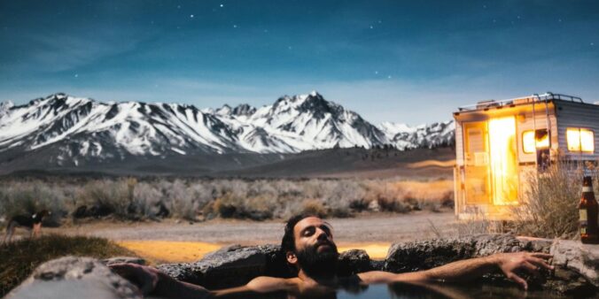 man swimming in spring